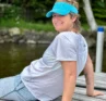 Photo of Molly Booker sitting on a dock