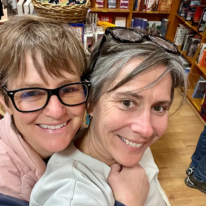 Photo of Molly Booker and Kelly Booker in a bookstore