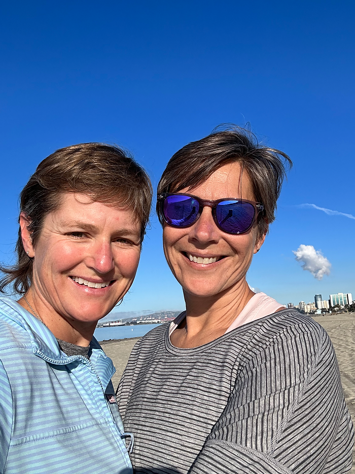 Photo of Molly Booker and Kelly Booker at the beach