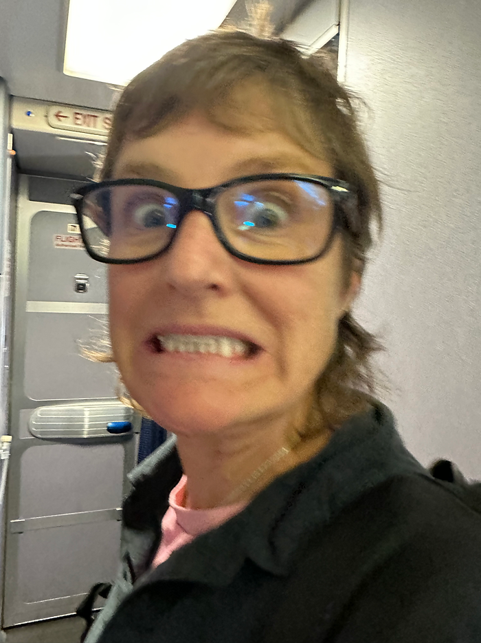 Photo of Molly Booker on an airplane