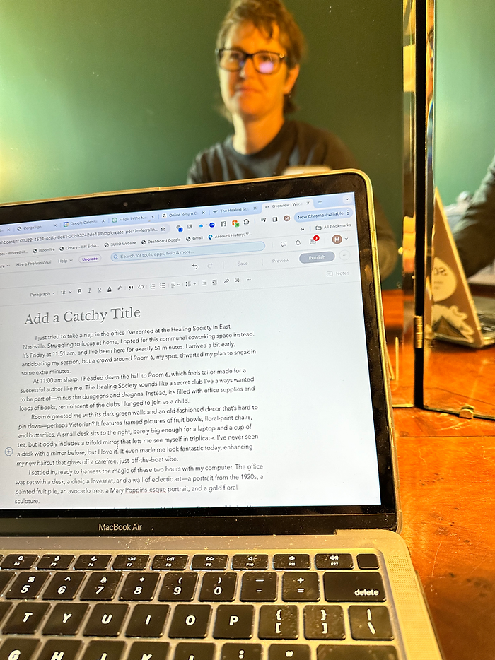 Photo of Molly Booker in the background with a laptop in the foreground